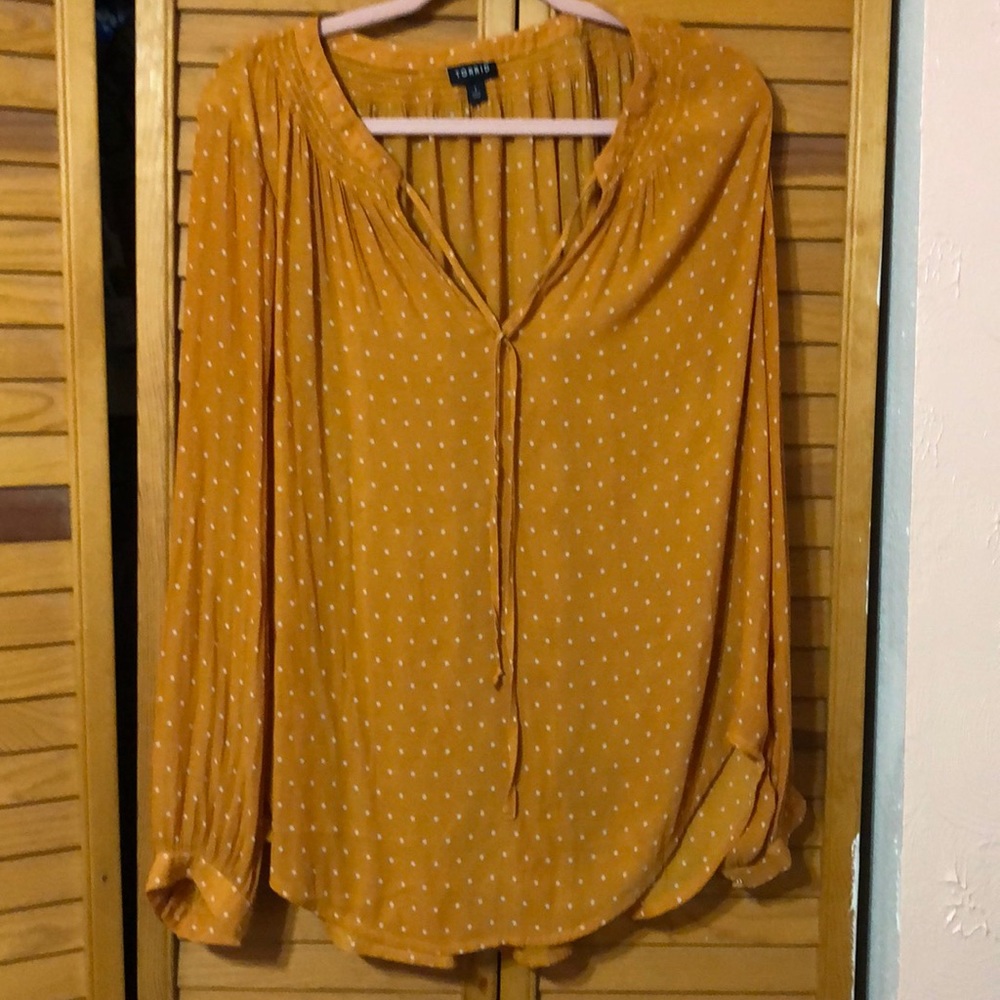 Torrid size 1 chiffon top. Golden color with white dots.